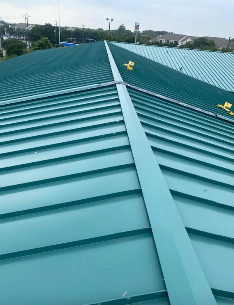 Green commercial metal roof ridge and valley for Metal Roof Repair in El Granada